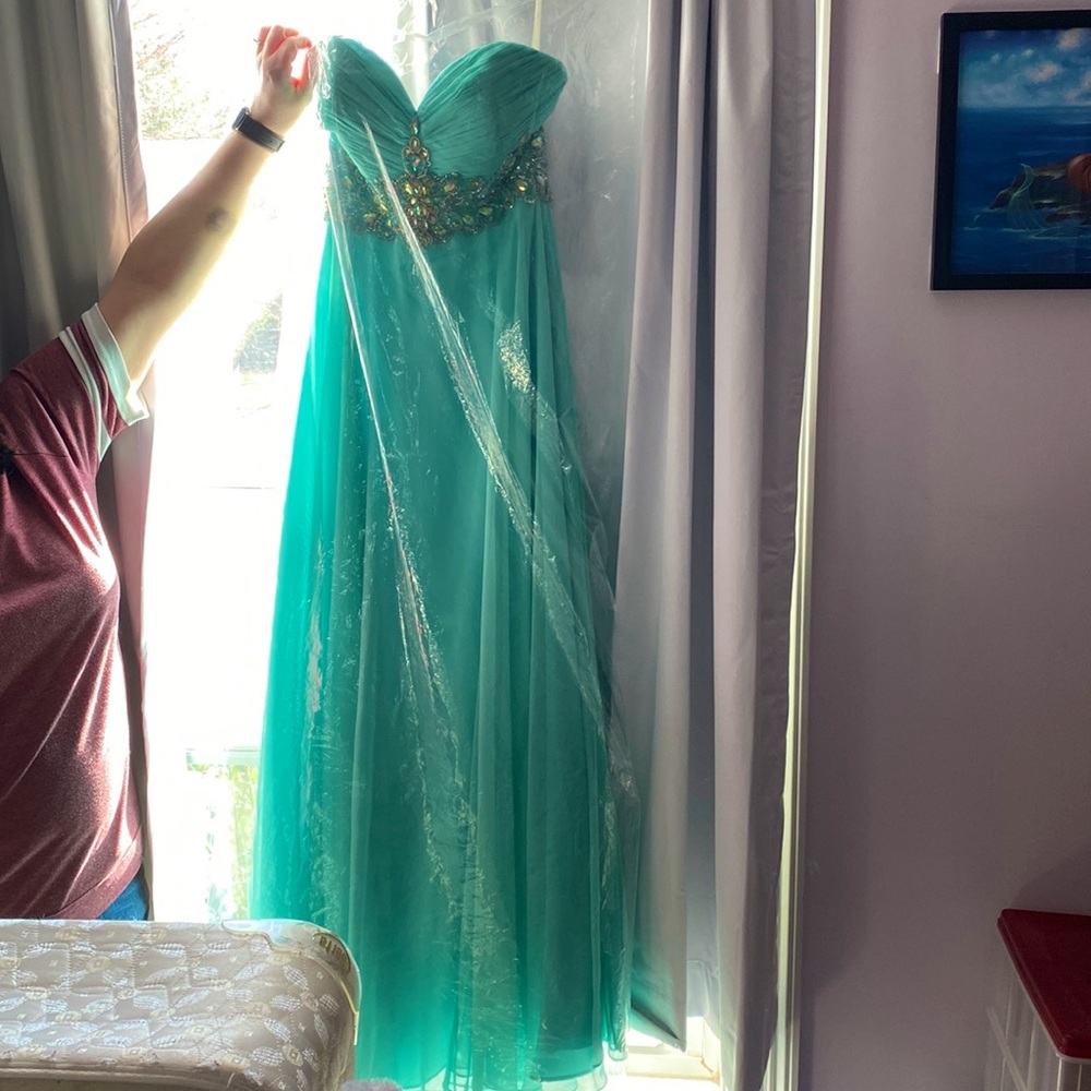 Prom dress bought for over $300. Selling for $80, beads all intact.